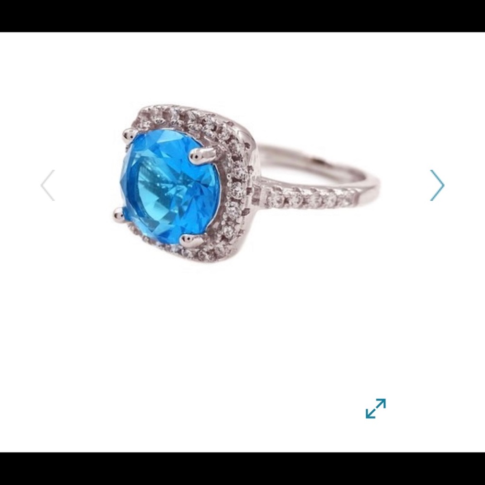 Sterling silver blue topaz ring